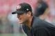 TAMPA, FL - DECEMBER 15: Coach Jim Harbaugh of the San Francisco 49ers watches warmups before play against the Tampa Bay Buccaneers December 15, 2013 at Raymond James Stadium in Tampa, Florida. The 49ers won 33 - 14. (Photo by Al Messerschmidt/Getty Ima