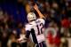 BALTIMORE, MD - DECEMBER 22: Quarterback Tom Brady #12 of the New England Patriots celebrates a second half touchdown against the Baltimore Ravens during the Patriots 41-7 win at M&T Bank Stadium on December 22, 2013 in Baltimore, Maryland. (Photo by Rob