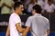 MELBOURNE, AUSTRALIA - JANUARY 19: Bernard Tomic of Australia congratulates Roger Federer of Switzerland on winning their third round match during day six of the 2013 Australian Open at Melbourne Park on January 19, 2013 in Melbourne, Australia. (Photo