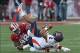 Nov 9, 2013; Bloomington, IN, USA; Indiana Hoosiers defensive tackle Darius Latham (98) sacks Illinois Fighting Illini quarterback Nathan Scheelhaase (2) during the first quarter at Memorial Stadium. Mandatory Credit: Pat Lovell-USA TODAY Sports