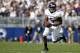 STATE COLLEGE, PA - OCTOBER 06: Venric Mark #5 of the Northwestern Wildcats carries the ball against the Penn State Nittany Lions during the game on October 6, 2012 at Beaver Stadium in State College, Pennsylvania. The Nittany Lions defeated the Wildcat