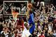 Dec 7, 2013; Portland, OR, USA; Dallas Mavericks shooting guard Monta Ellis (11) hits the game winning shot over Portland Trail Blazers shooting guard Wesley Matthews (2) during the fourth quarter of the game at Moda Center. The Mavs won the game 108-106.