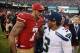 December 8, 2013; San Francisco, CA, USA; San Francisco 49ers quarterback Colin Kaepernick (7) shakes hands with Seattle Seahawks quarterback Russell Wilson (3) after the game at Candlestick Park. The 49ers defeated the Seahawks 19-17. Mandatory Credit: K