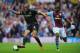 BIRMINGHAM, ENGLAND - SEPTEMBER 28: Manchester City player Vincent Kompany (l) battles for the ball with Yacouba Sylla during the Barclays Premier League match between Aston Villa and Manchester City at Villa Park on September 28, 2013 in Birmingham, Eng