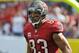 TAMPA, FL - DECEMBER 8: Wide receiver Vincent Jackson #83 of the Tampa Bay Buccaneers runs to the bench after an end zone catch against the Buffalo Bills December 8, 2013 at Raymond James Stadium in Tampa, Florida. The Bucs won 27 - 6. (Photo by Al Mes