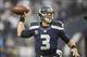 Dec 22, 2013; Seattle, WA, USA; Seattle Seahawks quarterback Russell Wilson (3) passes against the Arizona Cardinals during the fourth quarter at CenturyLink Field. Mandatory Credit: Joe Nicholson-USA TODAY Sports