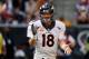 HOUSTON, TX - DECEMBER 22: Peyton Manning #18 of the Denver Broncos celebrates after throwing a touchdown during the game against the Houston Texans at Reliant Stadium on December 22, 2013 in Houston, Texas. (Photo by Scott Halleran/Getty Images)