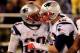 BALTIMORE, MD - DECEMBER 22: Running back LeGarrette Blount #29 and quarterback quarterback Tom Brady #12 of the New England Patriots celebrate after Blount rushed for a second half touchdown against the Baltimore Ravens during the Patriots 41-7 win at M&