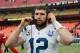 Dec 22, 2013; Kansas City, MO, USA; Indianapolis Colts quarterback Andrew Luck (12) speaks to media after the game against the Kansas City Chiefs at Arrowhead Stadium. The Colts won 23-7. Mandatory Credit: Denny Medley-USA TODAY Sports
