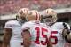 Dec 15, 2013; Tampa, FL, USA; San Francisco 49ers quarterback Colin Kaepernick (left) and guard Alex Boone (right) celebrate with wide receiver Michael Crabtree (15) after a touchdown during the first quarter of the game against the Tampa Bay Buccaneers a