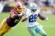 LANDOVER, MD - DECEMBER 22: DeMarco Murray #29 of the Dallas Cowboys is tackled in the fourth quarter by Kedric Golston #64 of the Washington Redskins at FedExField on December 22, 2013 in Landover, Maryland. (Photo by Greg Fiume/Getty Images)