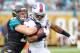 Dec 15, 2013; Jacksonville, FL, USA; Buffalo Bills running back CJ Spiller (28) runs against Jacksonville Jaguars linebacker Paul Posluszny (51) during the first half of the game at EverBank Field. Mandatory Credit: Melina Vastola-USA TODAY Sports