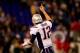 BALTIMORE, MD - DECEMBER 22: Quarterback Tom Brady #12 of the New England Patriots celebrates a second half touchdown against the Baltimore Ravens during the Patriots 41-7 win at M&T Bank Stadium on December 22, 2013 in Baltimore, Maryland. (Photo by Rob