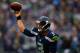 SEATTLE - DECEMBER 22: Russell Wilson #3 of the Seattle Seahawks throws against the Arizona Cardinals on December 22, 2013 at CenturyLink Field in Seattle, Washington. (Photo by Jonathan Ferrey/Getty Images)