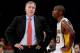 LOS ANGELES, CA - DECEMBER 08: Mike D'Antoni of the Los Angeles Lakers and Jodie Meeks #20 react during the game against the Toronto Raptors at Staples Center on December 8, 2013 in Los Angeles, California. NOTE TO USER: User expressly acknowledges and