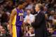 PHOENIX, AZ - DECEMBER 23: Head coach Mike D'Antoni of the Los Angeles Lakers talks with Wesley Johnson #11 during the NBA game against the Phoenix Suns at US Airways Center on December 23, 2013 in Phoenix, Arizona. The Suns defeated the Lakers 117-90. N