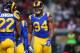 ST. LOUIS, MO - DECEMBER 22: Robert Quinn #94 of the St. Louis Rams celebrates after recording a sack against the Tampa Bay Buccaneers at the Edward Jones Dome on December 22, 2013 in St. Louis, Missouri. The Rams beat the Buccaneers 23-13. (Photo by Di
