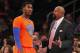 NEW YORK, NY - DECEMBER 25: Iman Shumpert #21 of the New York Knicks talks with head coach Mike Woodson during a game against the Oklahoma City Thunder at Madison Square Garden on December 25, 2013 in New York City. The Thunder defeated the Knicks 123-94.