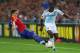 BASEL, SWITZERLAND - APRIL 25: Victor Moses (R) of Chelsea is challenged by Fabian Schar (L) of FC Basel during the UEFA Europa League Semi Final First Leg match between FC Basel 1893 and Chelsea at St. Jakob Stadium on April 25, 2013 in Basel, Switzerla