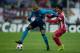 MADRID, SPAIN - DECEMBER 11: Fernando Reges (L) of FC Porto competes for the ball with Oliver Torres (R) of Atletico de Madrid during the UEFA Champions League Group G match at Vicente Calderon Stadium on December 11, 2013 in Madrid, Spain. (Photo by Go