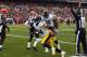 CLEVELAND, OH - NOVEMBER 24: Wide receiver Antonio Brown #84 of the Pittsburgh Steelers celebrates after scoring a touchdown with Jerricho Cotchery #89 as defenders Tashaun Gipson #39 and Joe Haden #23 of the Cleveland Browns look on at FirstEnergy Stadi
