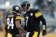 PITTSBURGH, PA - DECEMBER 08: Antonio Brown #84 and Ben Roethlisberger #7 of the Pittsburgh Steelers celebrate their third quarter touchdown play against the Miami Dolphins at Heinz Field on December 8, 2013 in Pittsburgh, Pennsylvania. (Photo by Gregor
