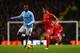 MANCHESTER, ENGLAND - DECEMBER 26: Philippe Coutinho of Liverpool is closed down by Yaya Toure of Manchester City during the Barclays Premier League match between Manchester City and Liverpool at Etihad Stadium on December 26, 2013 in Manchester, England.