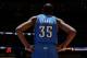 DENVER, CO - December 17: Kevin Durant #35 of the Oklahoma City Thunder looks on during the game against the Denver Nuggets on December 17, 2013 at the Pepsi Center in Denver, Colorado. NOTE TO USER: User expressly acknowledges and agrees that, by downloa