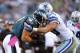 PHILADELPHIA, PA - OCTOBER 20: Tight end Brent Celek #87 of the Philadelphia Eagles makes a first down catch and is tackled by linebacker Sean Lee #50 of the Dallas Cowboys in the fourth quarter during a game at Lincoln Financial Field on October 20, 2013