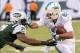 Dec 1, 2013; East Rutherford, NJ, USA; Miami Dolphins wide receiver Brian Hartline (82) is tackled by New York Jets defensive back Ellis Lankster (21) during the game at MetLife Stadium. Mandatory Credit: Robert Deutsch-USA TODAY Sports