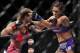 April 13, 2013; Las Vegas, NV, USA; Miesha Tate hits Cat Zingano during the TUF 17 Finale at the Mandalay Bay Events Center. Mandatory Credit: Gary A. Vasquez-USA TODAY Sports