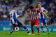 BARCELONA, SPAIN - OCTOBER 19: Koke Resurreccion of Atletico de Madrid duels for the ball with David Lopez of RCD Espanyol during the La Liga match between RCD Espanyol and Club Atletico de Madrid at Cornella-El Prat Stadium on October 19, 2013 in Barcel