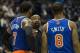 Dec 18, 2013; Milwaukee, WI, USA; New York Knicks head coach Mike Woodson talks to forward Carmelo Anthony (7) and guard J.R. Smith (8) during the first overtime period against the Milwaukee Bucks at BMO Harris Bradley Center. New York won 107-101 in dou
