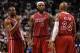Dec 18, 2013; Miami, FL, USA; Miami Heat shooting guard Dwyane Wade (left) talks with small forward LeBron James (center) and shooting guard Ray Allen (right) during the second half against the Indiana Pacers at American Airlines Arena. Miami won 97-94. M