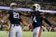 ATLANTA, GA - DECEMBER 07: Tre Mason #21 of the Auburn Tigers celebrates his fourth quarter touchdown with teammate quarterback Nick Marshall #14 against the Missouri Tigers during the SEC Championship Game at Georgia Dome on December 7, 2013 in Atlanta,