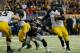 ATLANTA, GA - DECEMBER 07: Quarterback James Franklin #1 of the Missouri Tigers runs in a two-point conversion past Chris Davis #11 of the Auburn Tigers in the third quarter during the SEC Championship Game at Georgia Dome on December 7, 2013 in Atlanta,