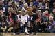Dec 27, 2013; Sacramento, CA, USA; Miami Heat point guard Norris Cole (30) and shooting guard Roger Mason Jr. (21) combine for a foul against Sacramento Kings point guard Isaiah Thomas (22) in the final seconds of overtime at Sleep Train Arena. The Sacram