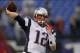 Dec 22, 2013; Baltimore, MD, USA; New England Patriots quarterback Tom Brady (12) warms up prior to the game against the Baltimore Ravens at M&T Bank Stadium. Mandatory Credit: Mitch Stringer-USA TODAY Sports