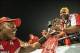 Dec 28, 2013; Orlando, FL, USA; Louisville Cardinals quarterback Teddy Bridgewater (5) shows the MVP trophy to his mother after Louisville defeated the Miami Hurricanes in the Russell Athletic Bowl at Florida Citrus Bowl Stadium. Mandatory Credit: Rob Fol