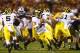 Dec 28, 2013; Tempe, AZ, USA; Michigan Wolverines quarterback Shane Morris (7) scrambles in the first half against the Kansas State Wildcats during the Buffalo Wild Wings Bowl at Sun Devil Stadium. Mandatory Credit: Mark J. Rebilas-USA TODAY Sports
