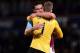 LONDON, ENGLAND - APRIL 17: Andy Carroll of West Ham United and David De Gea of Manchester United hug after the Barclays Premier League match between West Ham United and Manchester United at the Boleyn Ground on April 17, 2013 in London, England. (Photo
