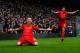 LONDON, ENGLAND - DECEMBER 29: Martin Skrtel of Liverpool celebrates with teammate Luis Suarez (R) after scoring the opening goal during the Barclays Premier League match between Chelsea and Liverpool at Stamford Bridge on December 29, 2013 in London, En