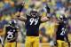 Dec 29, 2013; Pittsburgh, PA, USA; Pittsburgh Steelers defensive end Brett Keisel (99) pumps the crowd up against the Cleveland Browns in the second half at Heinz Field. The Steelers won the game, 20-7. Mandatory Credit: Jason Bridge-USA TODAY Sports