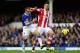 LIVERPOOL, ENGLAND - NOVEMBER 30: Leon Osman of Everton in action with Geoff Cameron of Stoke City during the Barclays Premier League match between Everton and Stoke City at Goodison Park on November 30, 2013 in Liverpool, England. (Photo by Clive Bruns