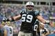Dec 22, 2013; Charlotte, NC, USA; Carolina Panthers middle linebacker Luke Kuechly (59) reacts in the fourth quarter. The Panthers defeated the Saint 17-13 at Bank of America Stadium. Mandatory Credit: Bob Donnan-USA TODAY Sports