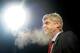 BRADFORD, ENGLAND - DECEMBER 11: Arsene Wenger the Arsenal manager looks on during the Capital One Cup quarter final match between Bradford City and Arsenal at the Coral Windows Stadium, Valley Parade on December 11, 2012 in Bradford, England. (Photo by