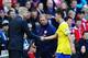 SUNDERLAND, ENGLAND - SEPTEMBER 14: Arsenal manager Arsene Wenger shakes hands with Mesut Oezil of Arsenal as he is substituted during the Barclays Premier League match between Sunderland and Arsenal at the Stadium of Light on September 14, 2013 in Sunder