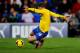 CARDIFF, WALES - NOVEMBER 30: Aaron Ramsey of Arsenal scores their third goal during the Barclays Premier League match between Cardiff City and Arsenal at Cardiff City Stadium on November 30, 2013 in Cardiff, Wales. (Photo by Mike Hewitt/Getty Images)