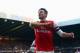 NEWCASTLE UPON TYNE, ENGLAND - DECEMBER 29: Olivier Giroud of Arsenal celebrates scoring the opening goal during the Barclays Premier League match between Newcastle United and Arsenal at St James' Park on December 29, 2013 in Newcastle upon Tyne, England