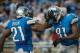 Oct 20, 2013; Detroit, MI, USA; Detroit Lions wide receiver Calvin Johnson (81) and running back Reggie Bush (21) celebrate during the game at Ford Field. Mandatory Credit: Tim Fuller-USA TODAY Sports